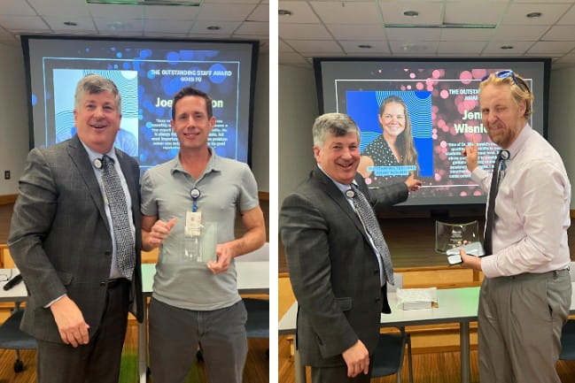 Dean Philip Hall with Outstanding Staff Award winner Joey Addison and Outstanding Teaching Award winner Jennifer Wisniewski, on screen, with award accepted by Chris Wisniewski 