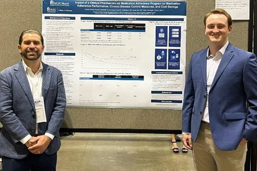 Taylor Morrisette and Charlie Worrall present a poster at APhA Annual Meeting 2024